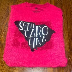 i am selling a T-shirt , south carolina on the front plain on the back